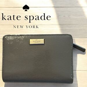 Kate Spade Tellie Bixby Place Gray Glossy Patent Leather Bifold Wallet